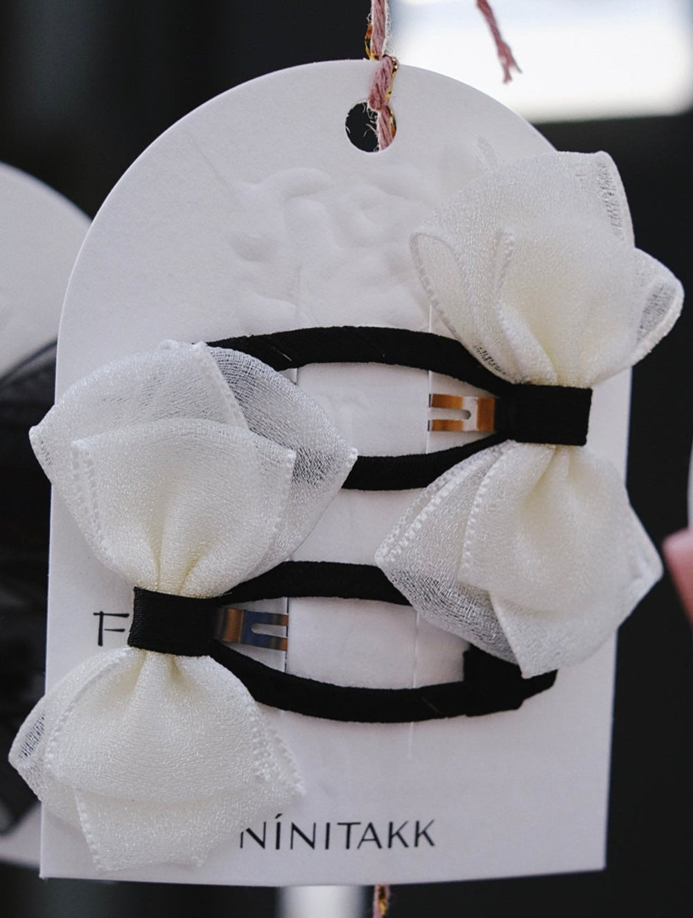 This cute hair clip is made from high-quality silky yarn for a smooth and elegant appearance.