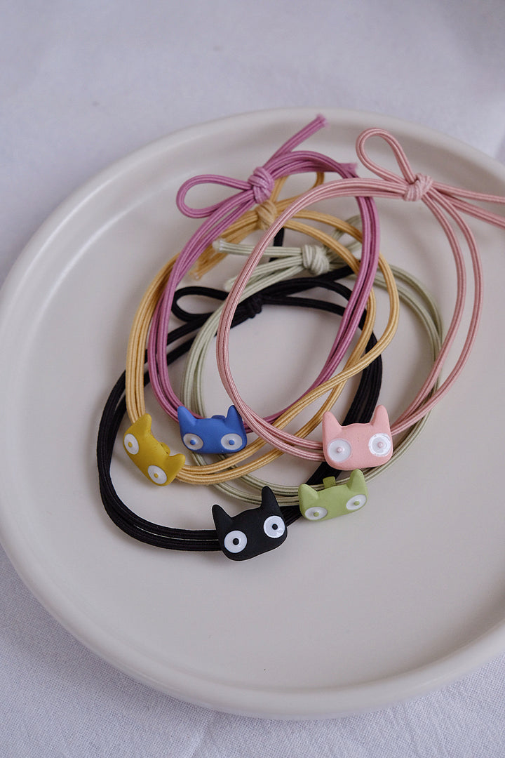 The playful and colorful assortment makes this set an ideal choice for cat enthusiasts looking to add some fun to their hair accessories collection.