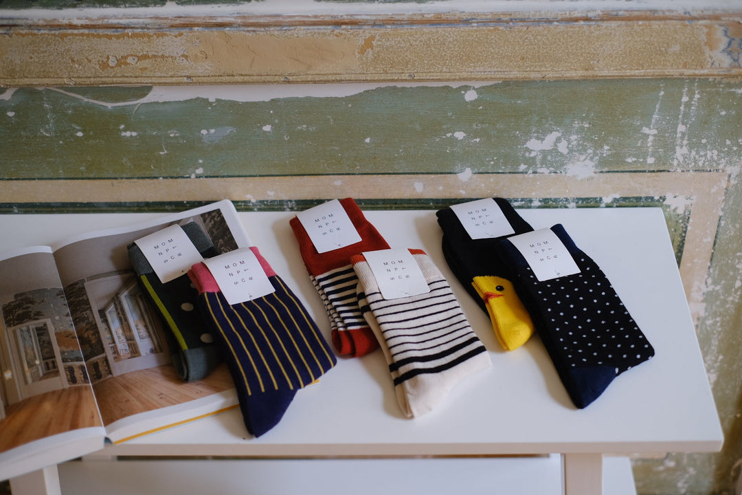Wear fun and colorful socks to brighten up your day, regardless of the weather.