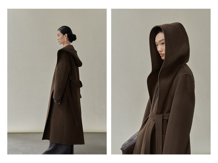 Side profile of the chocolate coat, illustrating its elegant length and practical hood.
