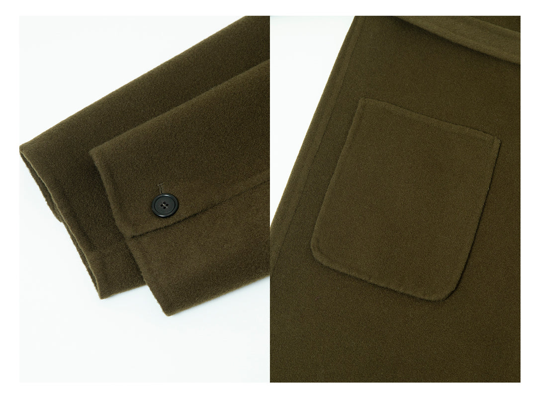 Close-up of the coat’s wool texture, emphasizing the high-quality material and elegant finish.