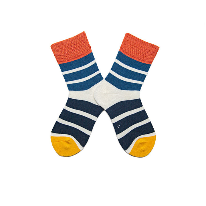 Kids' cotton socks in white with blue and black stripes, adorned with red and yellow sections.