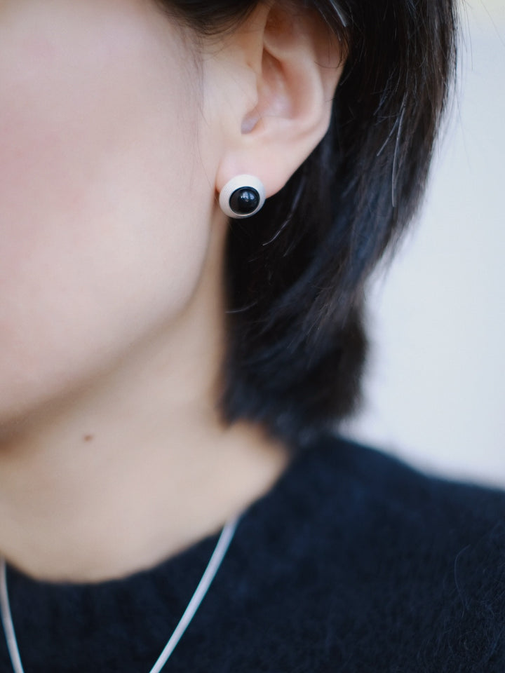 Let the Goddess stud earrings enhance your natural beauty and resonate with your inner goddess, perfectly symbolizing the duality and harmony of light and dark.