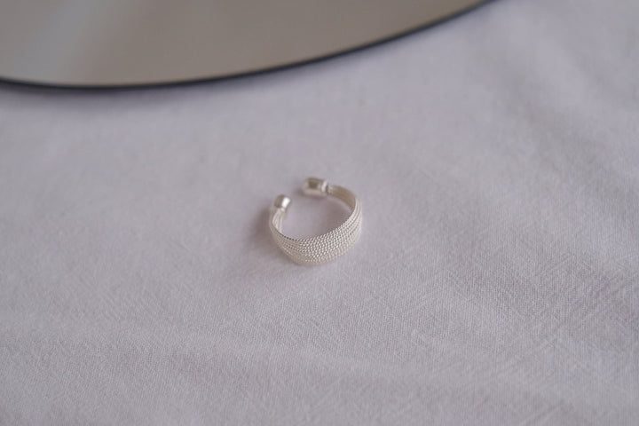 Top-down view of the Silver Ripples ring, showcasing its chunky yet elegant design.