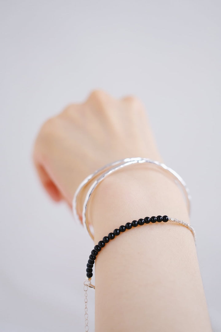 Perfect for those who appreciate versatile and timeless jewelry, the Armor sterling silver bangle complements any outfit, from casual to formal.