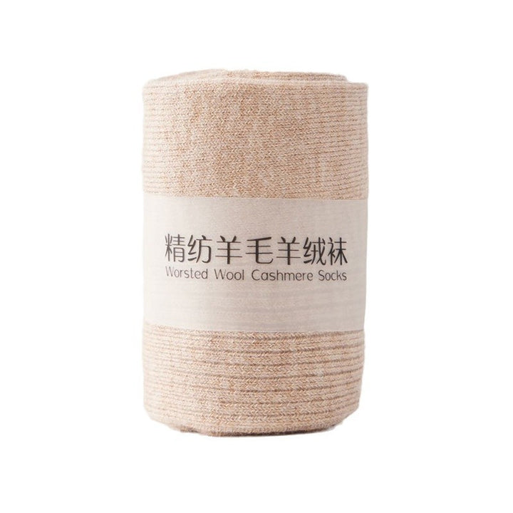 Close-up of soft wool and cashmere sock texture showing premium knit and color detail