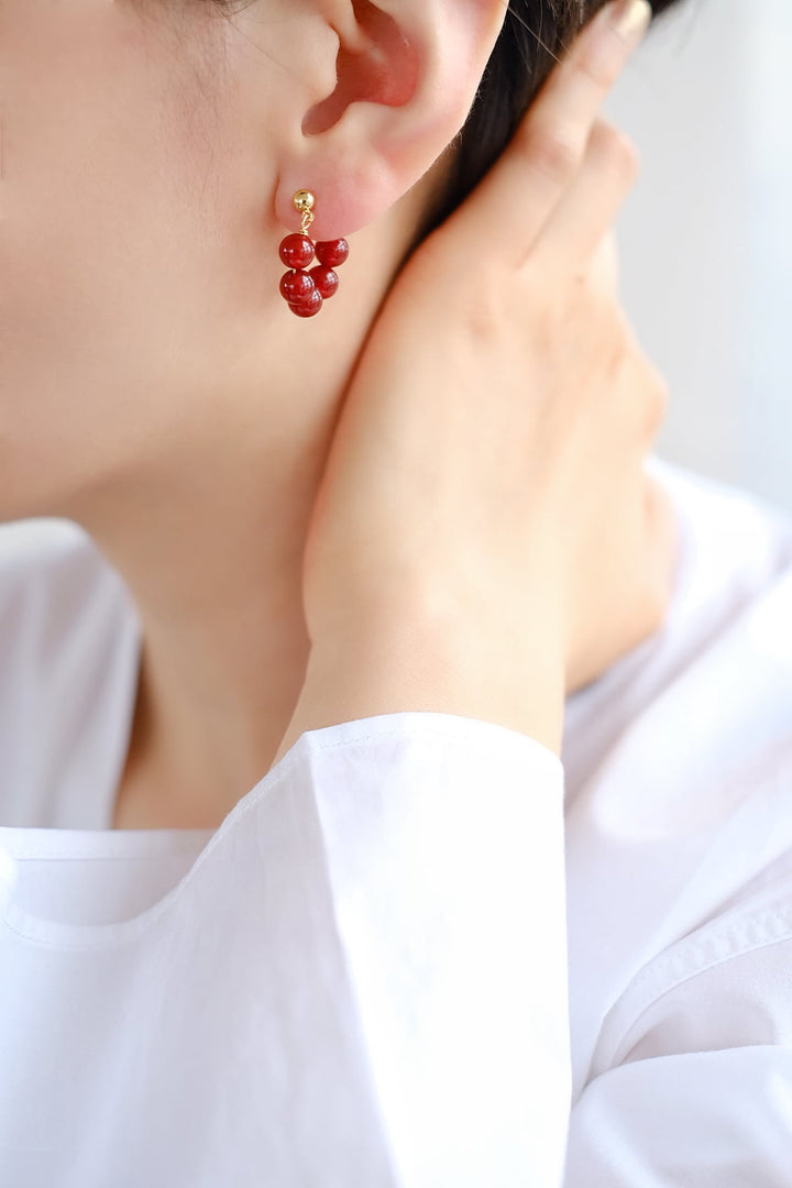 Perfect for gifting or personal indulgence, these red onyx hoop earrings add a touch of glamor to your everyday look or special events.