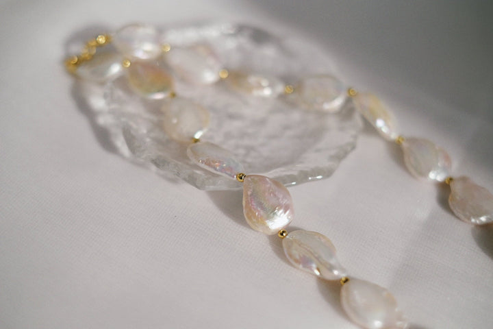 The 18k gold plated brass beads add another touch of luxury.