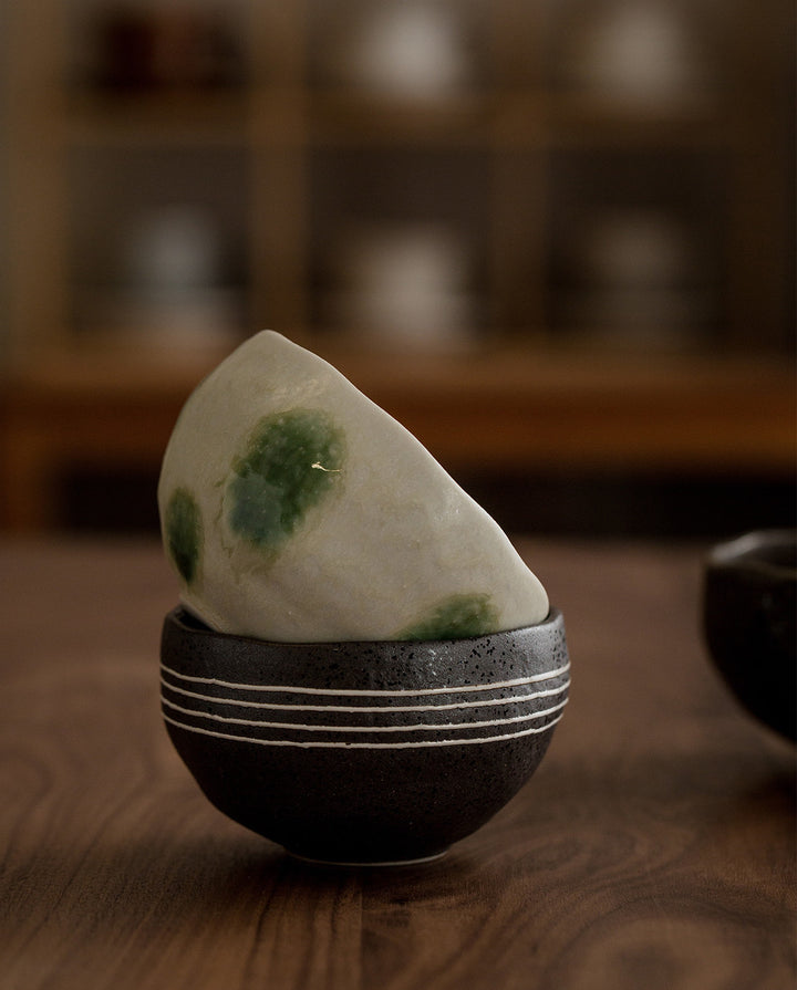 A closer look at the artful details, where form meets function in these beautifully handcrafted ceramic bowls.