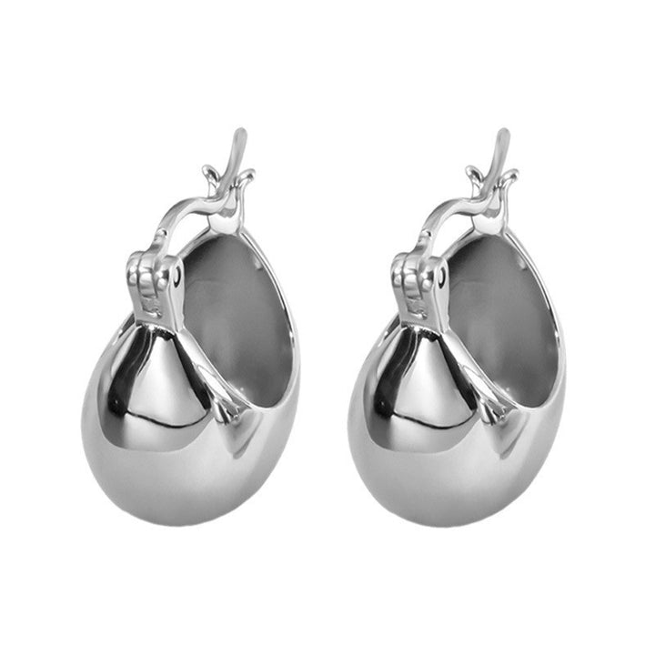 Chunky yet lightweight, the Vessel sterling silver earrings are a modern woman's must-have.