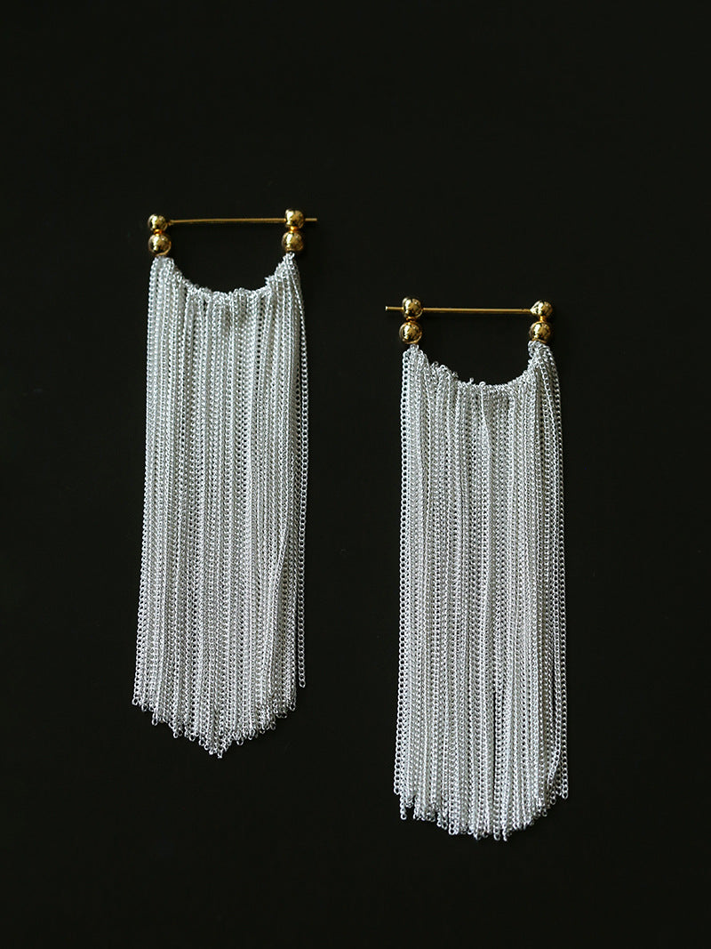 This pair of earrings with long tassels drapes down like waterfalls.