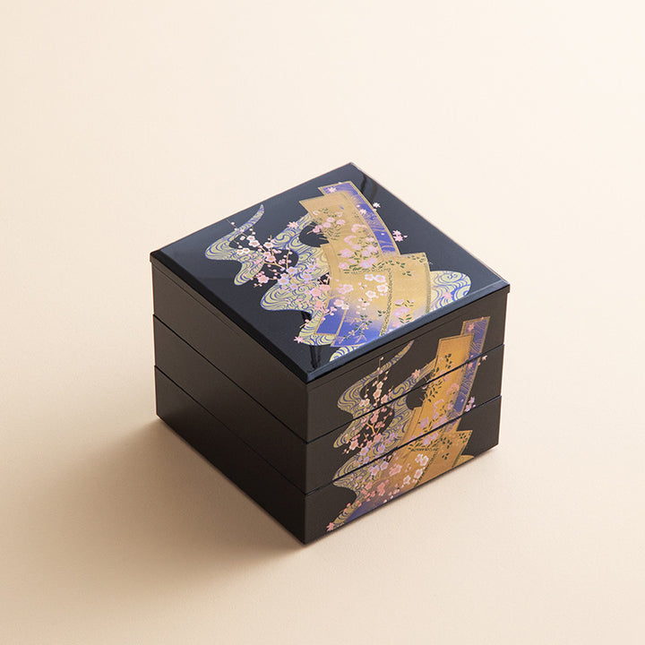 The Sensu & Waves design features gold leaf patterns of traditional Japanese folding fans and swirling waves, symbolizing elegance, strength, and fluidity.