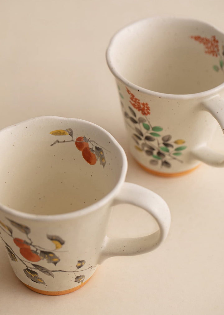 This top-down view emphasizes the slightly irregular, organic shapes of the Oriental Bloom cups. The natural curves and smooth finish are a testament to the Minoyaki craftsmanship, ensuring each cup is as comfortable to hold as it is beautiful to admire.