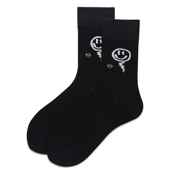 Pair of black socks featuring the smiley ghost design, displaying the quirky and fun motif.
