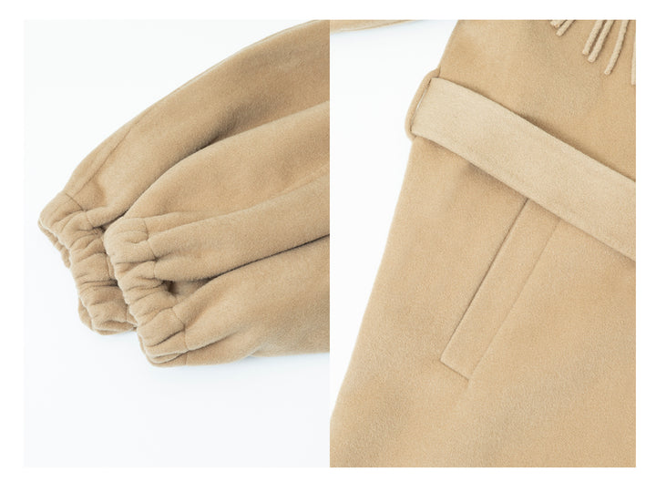 Close-up of the coat’s wool texture, highlighting the high-quality material.