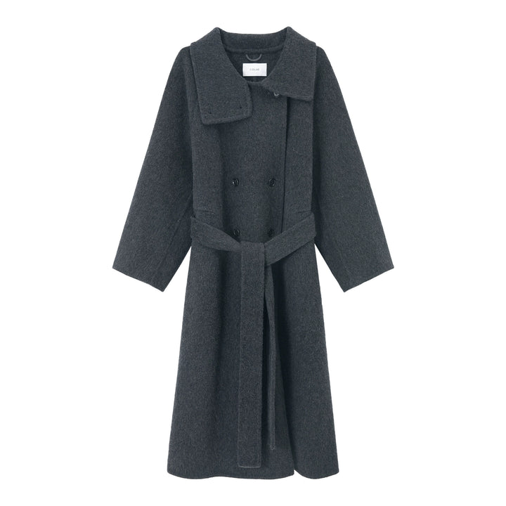 Front detail showing charcoal grey coat's double-breasted buttons and tie belt